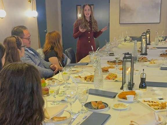 Ms. Mindy Tyner, CEO of Towne Kids, addresses Filipino nurses during the appreciation dinner in Lakewood.