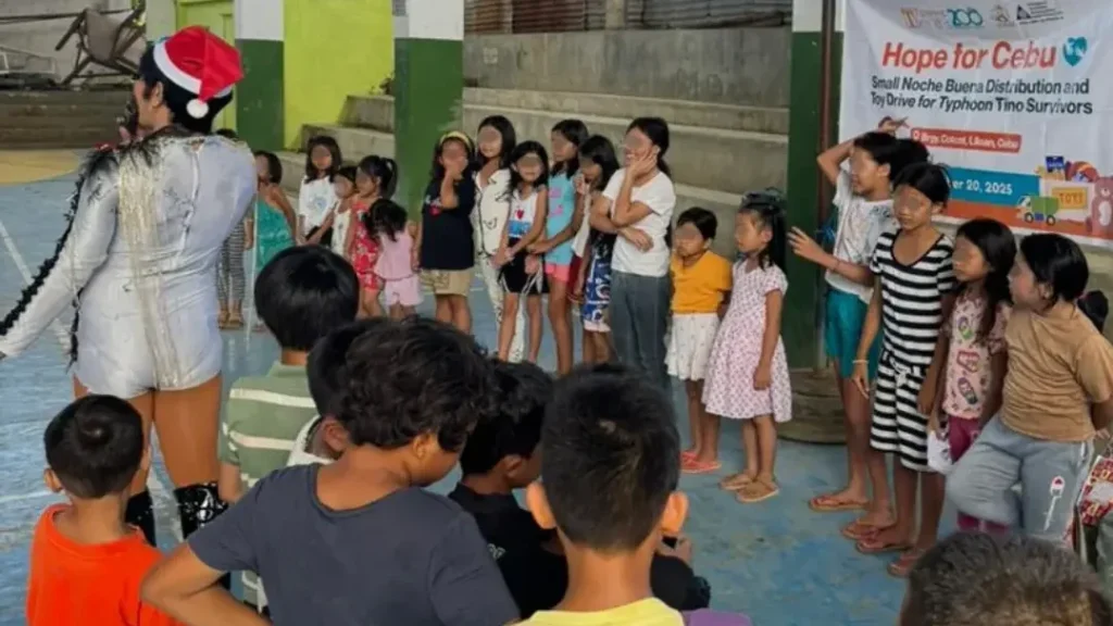 Cebu children smiling as they receive gifts from Towne Kids Toy Drive