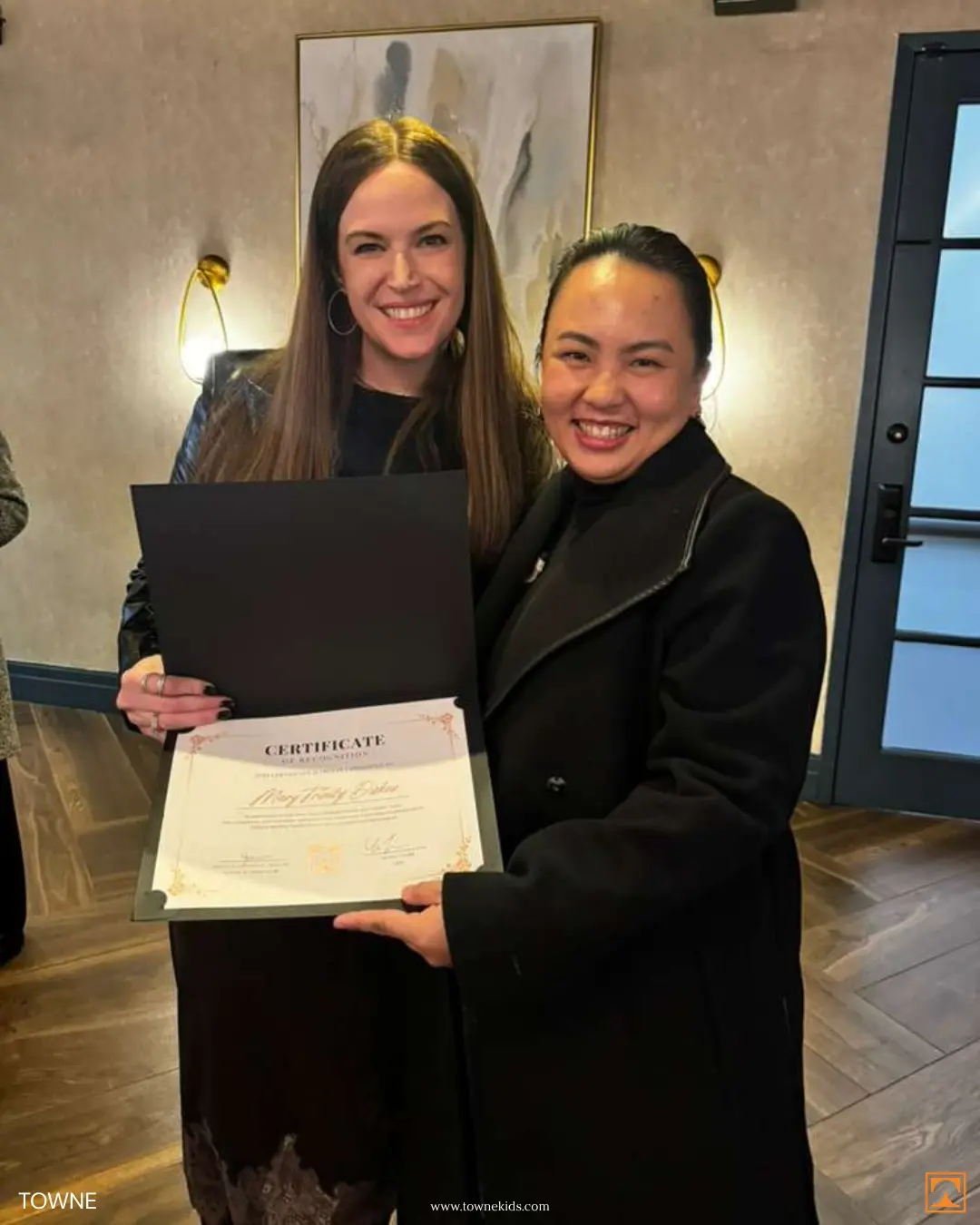 Towne Kids nurse receiving certificate of recognition for commitment and compassionate care